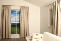 Verduisterend overgordijn Doel valt soepel en heeft een mooi subtiel patroon