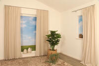 Inbetween Fierce is een elegante gordijnstof met een prachtig linneneffect