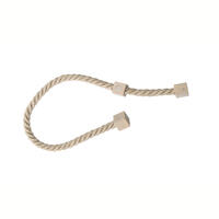 Magneet embrasse Balkan in een ecrukleur. Grof gedraaid koord met een sterke verschuifbare magneet