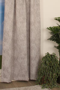 Lumina Reflect is een gladde dim-out overgordijnstof met een grafische print van gemêleerde kleuren