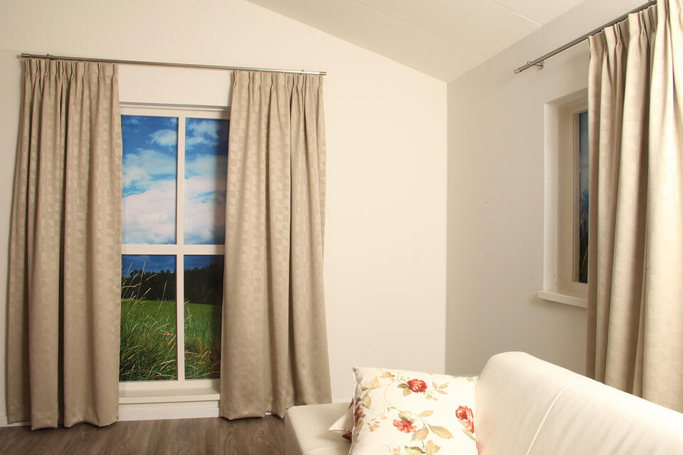 Verduisterend overgordijn Doel valt soepel en heeft een mooi subtiel patroon