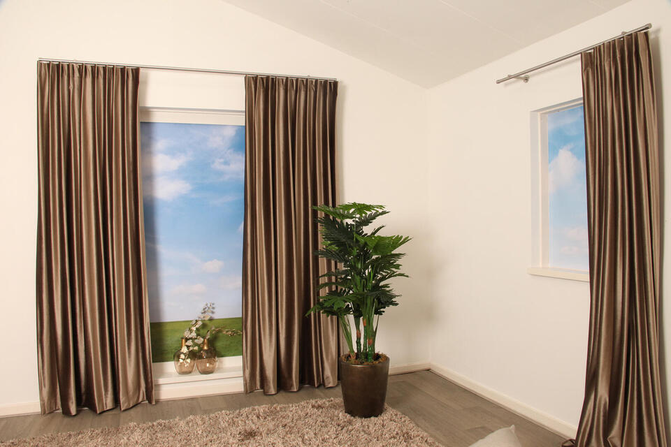 Deze mooie overgordijnstof is een echte sfeermaker, de stof zorgt voor privacy als het donker is