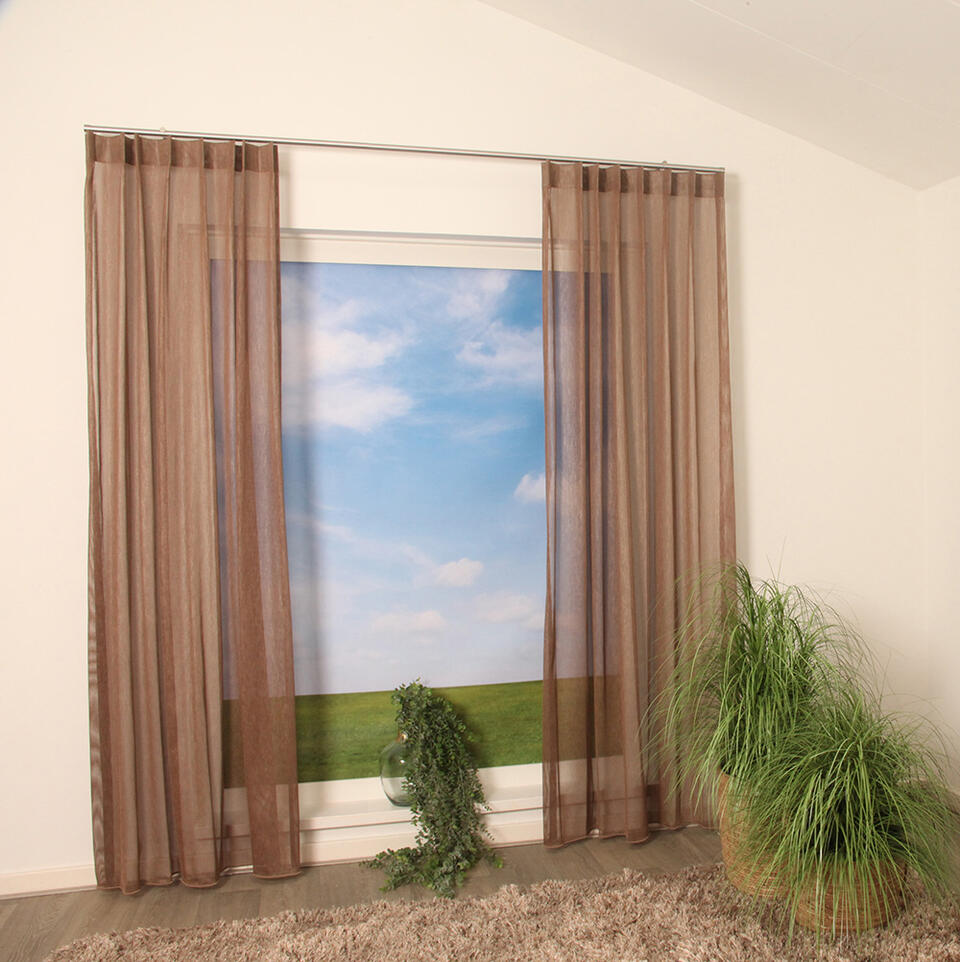 Met vitrage Tredos haal je een echte aanwinst in huis! Deze transparant geeft echt karakter aan je interieur